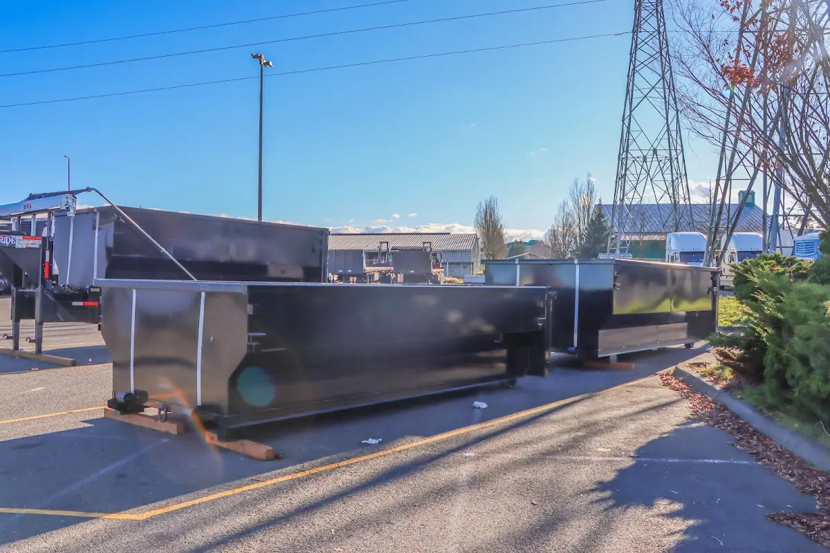 Roll-off dumpster ready for waste disposal at job site for Concrete Dumpster Rental in Lakeland